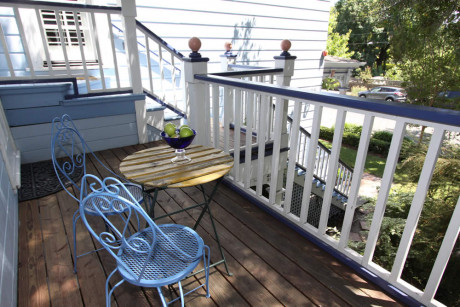 outdoor deck with table and two chairs